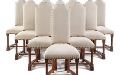 A Set of Fourteen Continental Oak Dining Chairs