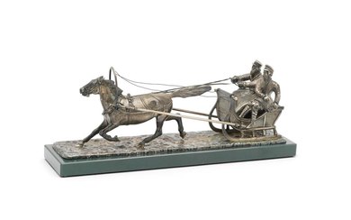 A silver group of a horse-drawn sleigh