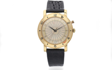 Tissot. A Yellow Gold World Time Bumper Automatic Wristwatch