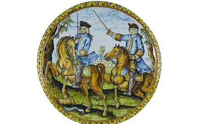 Tondo Round on board slightly enlarged. Maiolica painted in polychromy;...