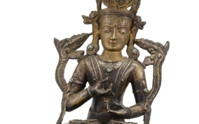 NEPALESE BRONZE FIGURE OF BUDDHA In seated position on a lotus throne. Inset turquoise details. Height 10.25".