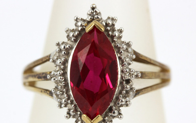 9CT RED STONE AND DIAMOND RING.