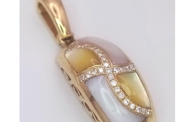 A 14 K yellow gold pendant with yellow and white Mother of p...