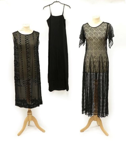 A 1920's Black Beaded Sleeveless Dress, the chiffon ground embellished...