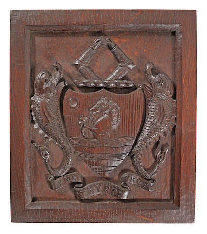 A 19th century carved oak armorial panel, English