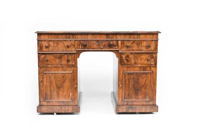 A 19th century rosewood veneered pedestal-form architect's-type desk