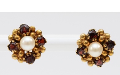 A 9ct gold pair of garnet and 4mm cultured pearl ear studs, ...
