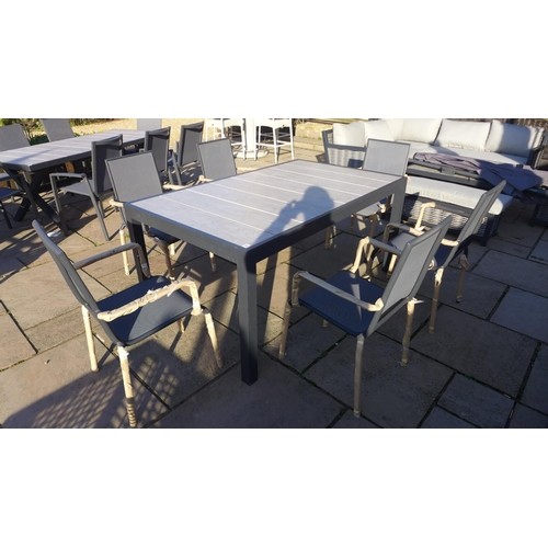 A Bramblecrest Seville dining table - 164cm x 95cm - with si...