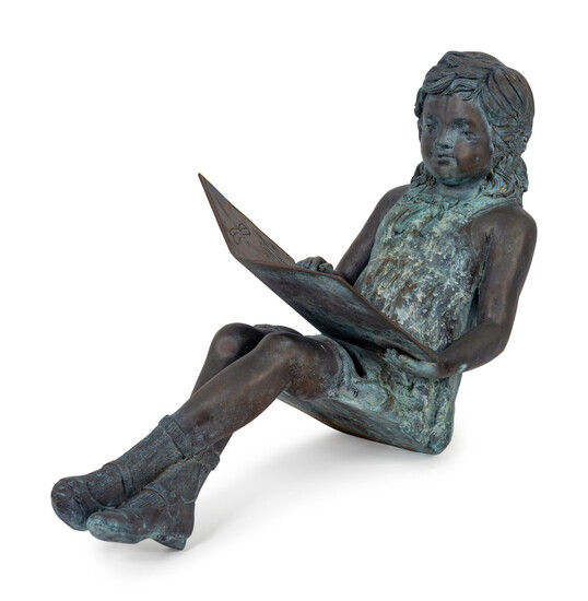 A Bronze Figure of a Young Girl Reading a Book