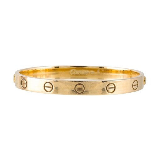 A CARTIER LOVE BANGLE, in 18ct yellow gold, signed Cartier, ...