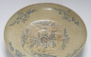 A Chinese Swatow blue and white dish, 17th century, 32cm dia...