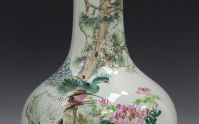 A Chinese famille rose porcelain bottle vase, probably Republic period, painted with two red-capped
