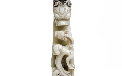 A Chinese pale jade 'dragon' belt hook Qing dynasty, 18th/19th century Typically...