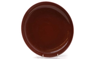 A Chinese red-glazed porcelain plate