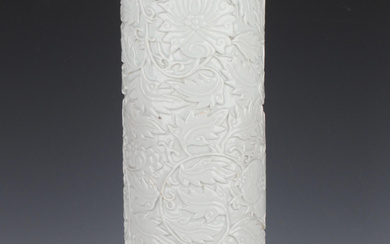 A Chinese white-glazed porcelain beaker vase, Qing dynasty, probably 18th century, of tall slender c