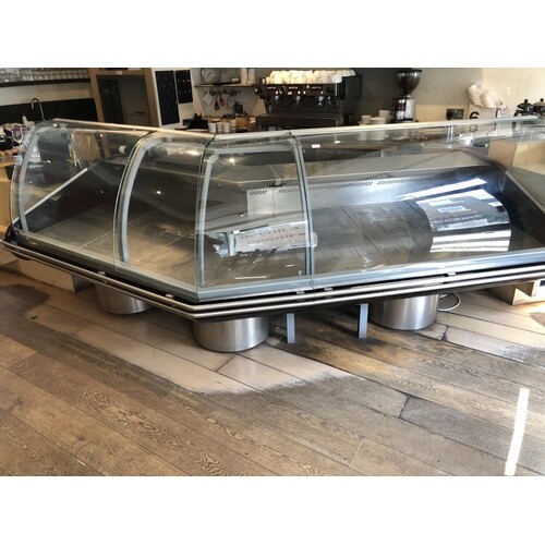 A DGD Curved stainless steel refrigerated counter unit. 115c...