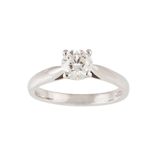 A DIAMOND SOLITAIRE RING, the brilliant cut diamond mounted ...