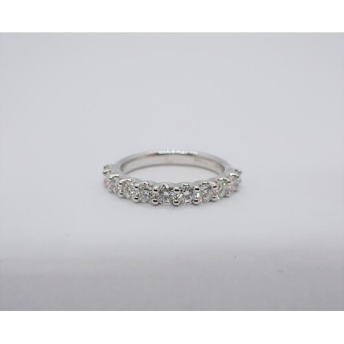 A Diamond half Eternity Ring claw-set brilliant-cut stones, ...