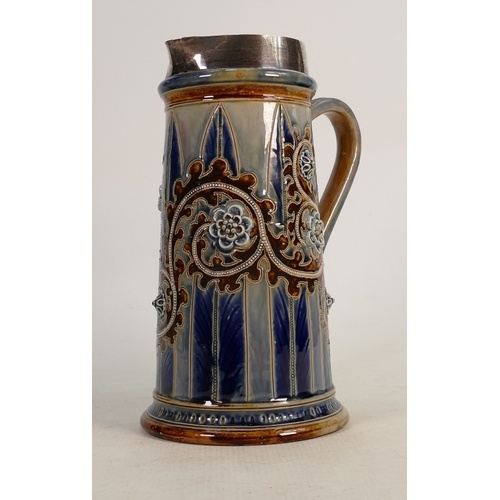 A Doulton Lambeth jug decorated with scrolling foliage: by G...