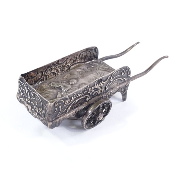 A Dutch silver miniature novelty cart, relief embossed lover...
