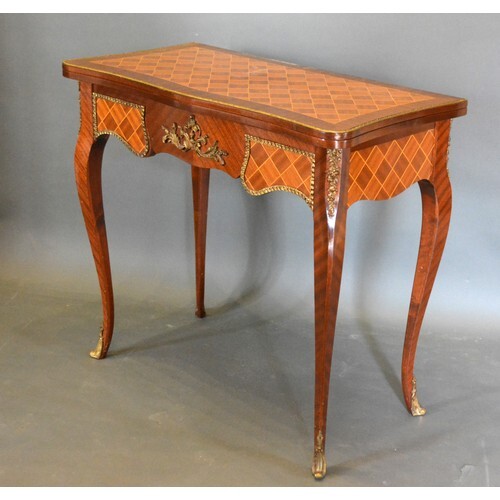A French Inlaid and Gilt Metal Mounted Card Table of serpent...