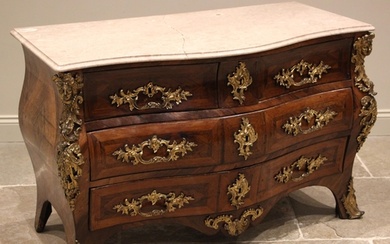 A French Louis XV ormulu mounted rosewood bombe commode, sta...