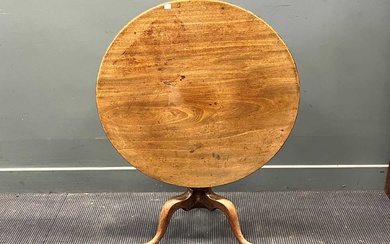 A George III mahogany circular occasional table, on turned column and pad feet 62 x 79cm; another
