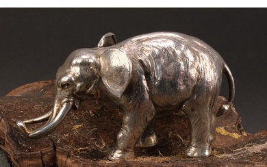 A German cast silver model, of an elephant, 14cm long, halbm...