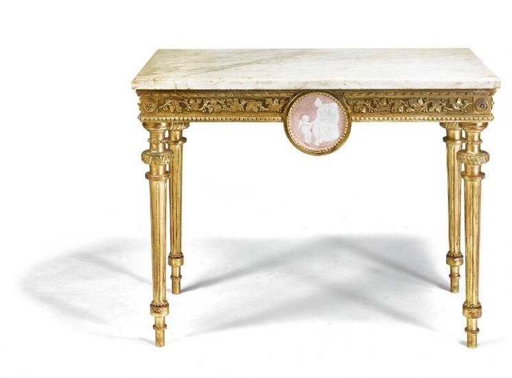 A Gustavian giltwood console with profiled white marble top. Sweden, late 18th century. H. 77 cm. W. 98 cm. D. 55 cm.