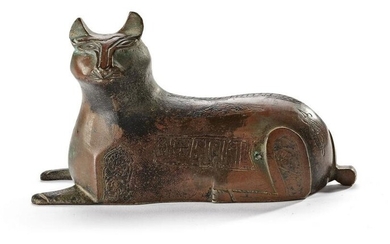 A KHORASAN BRONZE WEIGHT FIGURINE IN THE FORM OF A LION, PERSIA, 12TH CENTURY