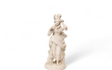 A LARGE PARIAN FIGURE GROUP Mid 19th century, a mother and c...