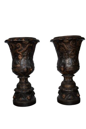 A Large Pair of Urns with Lady Faces Bronze Statue