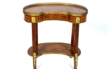 A Louis XVI Kidney-Shaped Table en Chiffoniere Height
