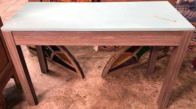 A MIRRORED CONSOLE TABLE