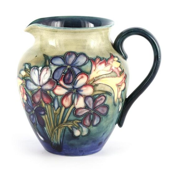 A MOORCROFT SHOULDERED TAPERING JUG tube lined and