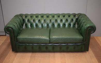 A MORAN THREE SEATER GREEN LEATHER CHESTERFIELD ( 72H x 193W x 92D CM) (PLEASE NOTE THIS HEAVY ITEM MUST BE REMOVED BY CARRIERS AT T...