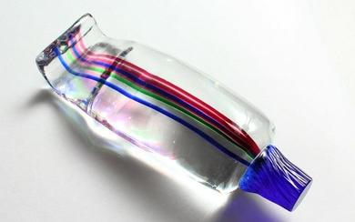 A MULTI-COLOURED STRIPED GLASS TOOTHPASTE TUBE. 8ins