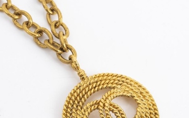 A NECKLACE BY CHANEL