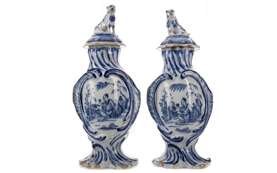 A PAIR OF 19TH CENTURY DUTCH DELFTWARE BLUE & WHITE VASES