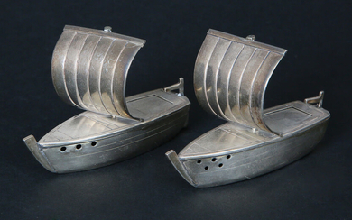 A PAIR OF STERLING SILVER SALTS MODELED AS SAIL BOATS