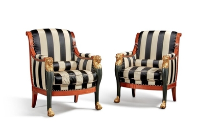 A Pair of Continental Empire Carved Mahogany, Ebonised and Giltwood Bergeres, Second Quarter 19th Century