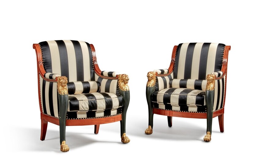 A Pair of Continental Empire Carved Mahogany, Ebonised and Giltwood Bergeres, Second Quarter 19th Century