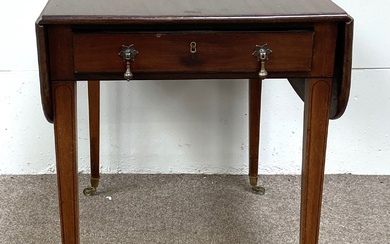 A Regency style mahogany Pembroke table, with drop leaf top and single end drawer, set on tapered