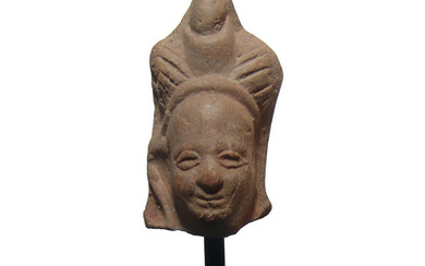 A Romano-Egyptian terracotta head of Harpokrates