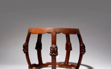 A SOUTHEAST ASIAN HARDWOOD STAND 19TH/20TH CENTURY With five curved...
