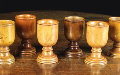 A Set of Six Turned Treen Goblets 14 cm in height (5½'').