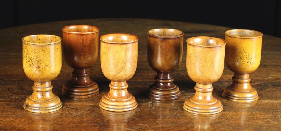 A Set of Six Turned Treen Goblets 14 cm in height (5½'').