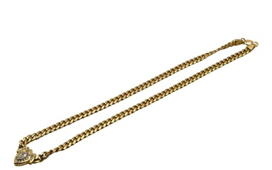 A VINTAGE 18CT YELLOW GOLD AND DIAMOND NECKLACE Having centr...