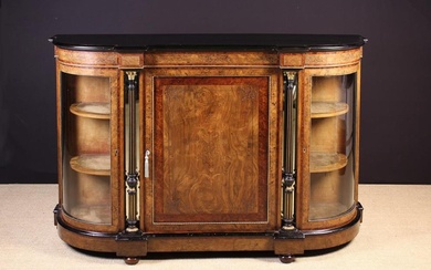 A Victorian Inlaid Credenza. The ebonised D-shaped top with moulded edge above bowed glass-panelled