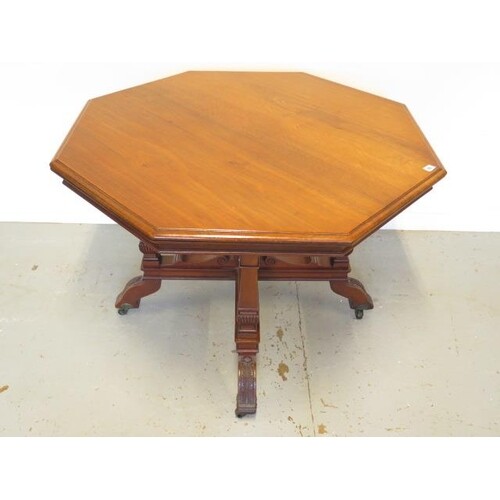 A Victorian mahogany octagonal centre table on square taperi...
